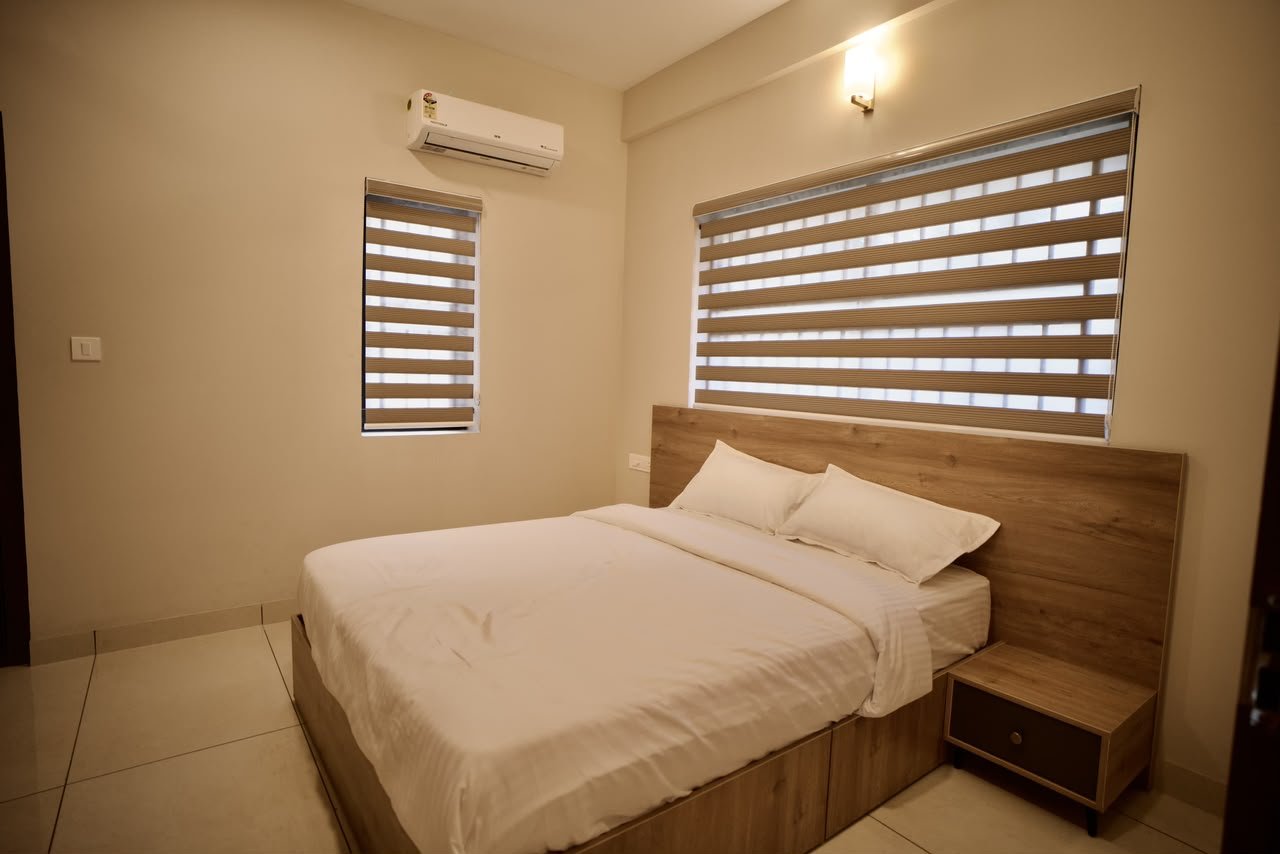 Cocostay Kozhikode bedroom